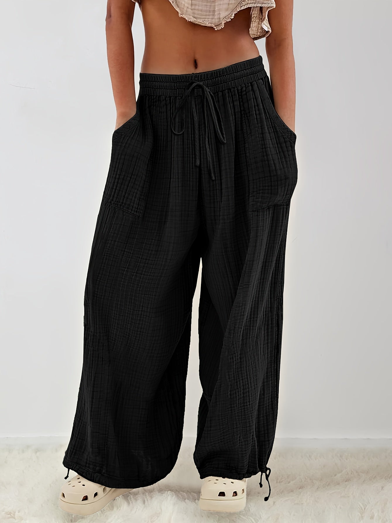 Chic Women's Loose Trousers with Diagonal Pockets and Lace-up Design